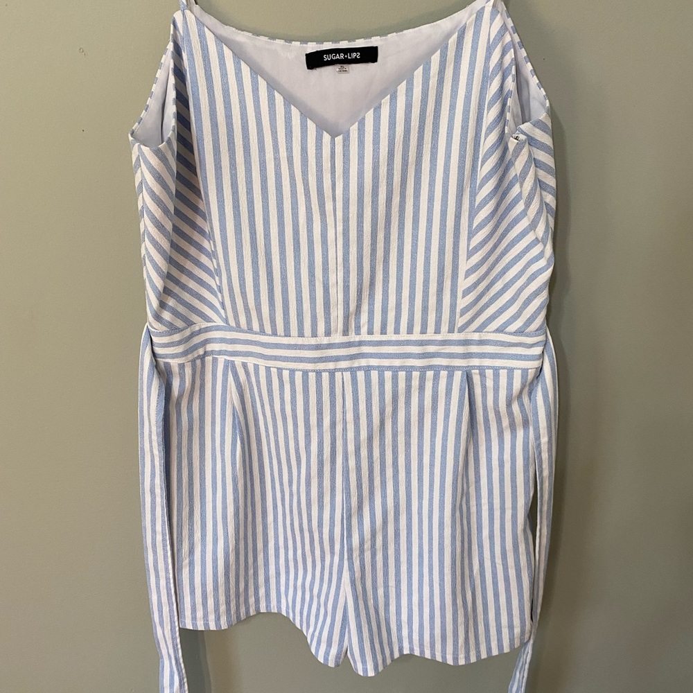 Baby blue and white striped romper.